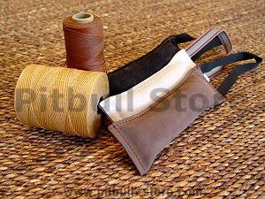 Dog bite tug made of leather with handle
